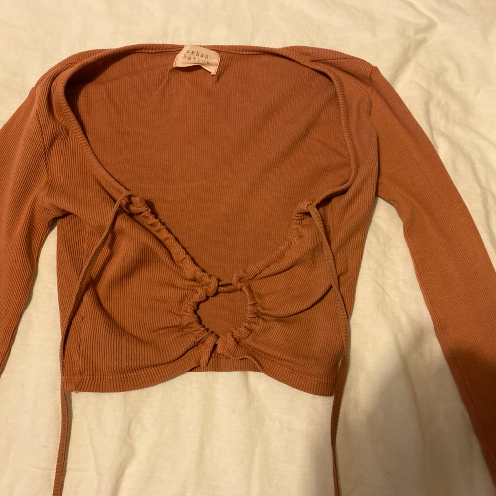 Copper colored long sleeve tie crop